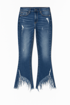 Blue jeans with frayed hem on a white background
